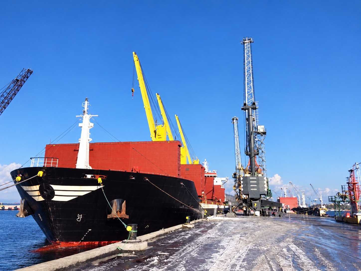 Cargo vessel loading minerals at Aliağa port, Turkey