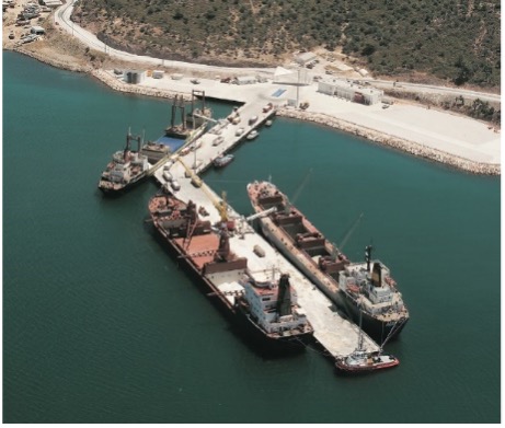Ships loading mineral cargo at Güllük port, Turkey